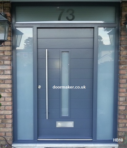 grey contemporary door and frame with sidelights and toplight
